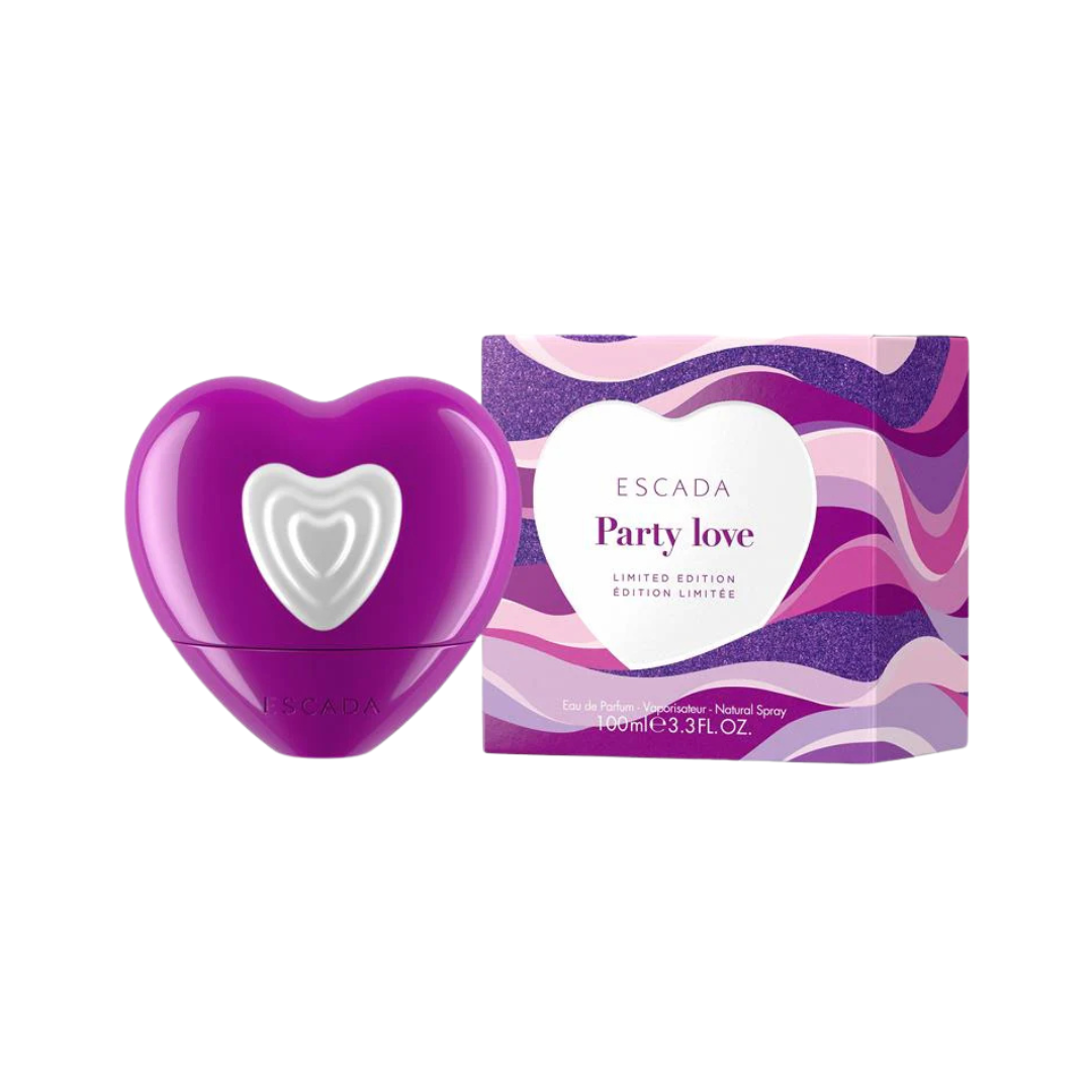 Purple heart shaped Escada perfume bottle